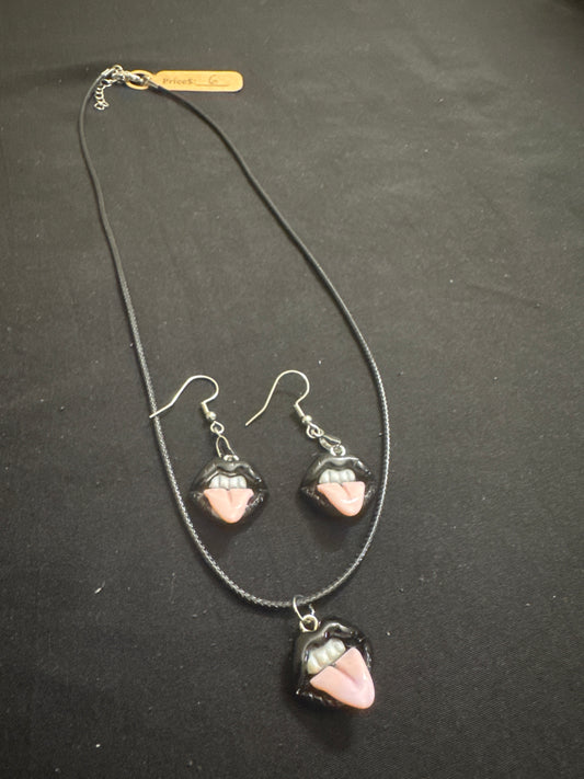 Black lips with tongue earring and necklace